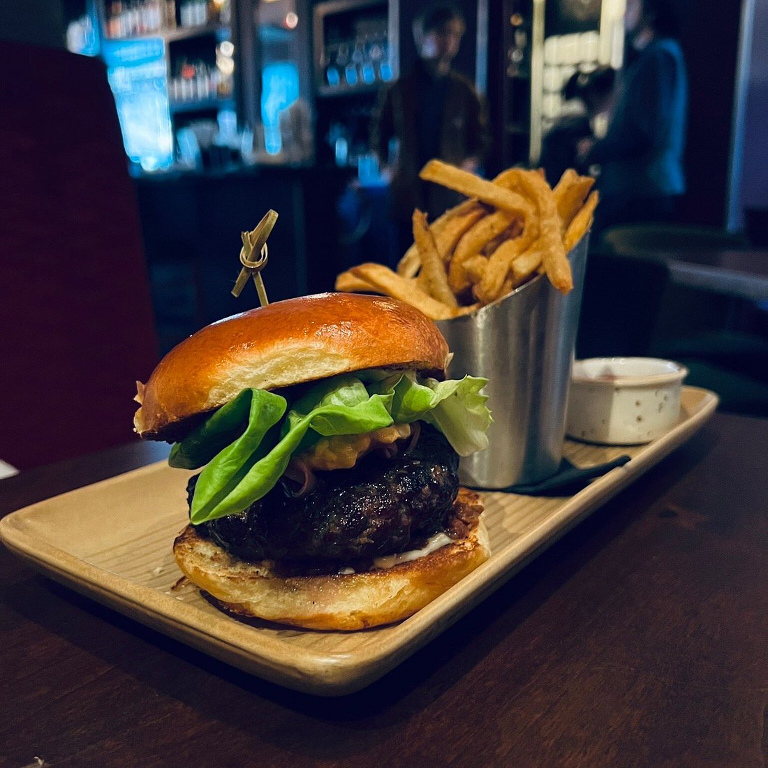 The Majestic Restaurant signature dishes The Majestic BurgerShrimp and GritsSeasonal Pasta Dishes